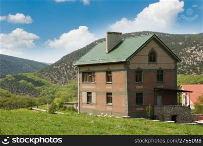 Country house in mountains. Crimean mountains and a cottage