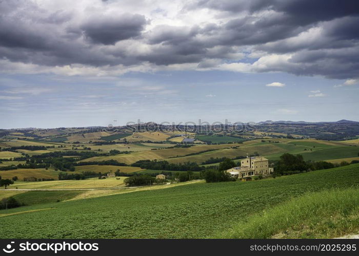 Country landscape along the road from Cingoli to Appignano, Ancona province, Marche, Italy, at springtime