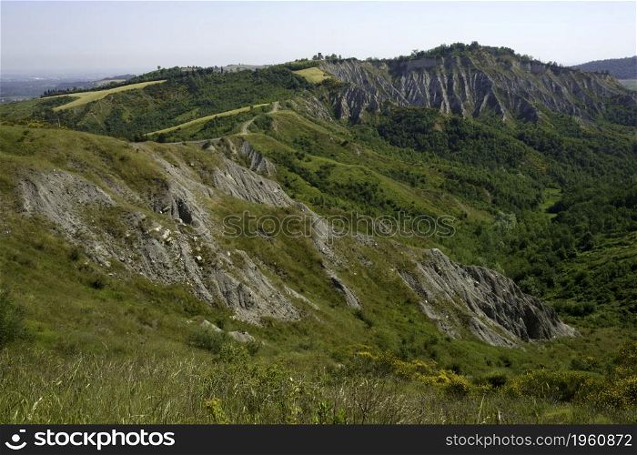 Country landscape on the hills in the Bologna province, Emilia-Romagna, Italy, near Imola and Riolo Terme, at springtime. Calanques