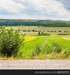 country landscape with road, fields and village, Kuban, Russia