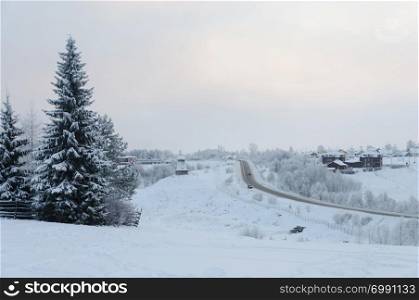 Country winter landscape, Malye Korely village, Arkhangelsk region, North Russia