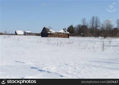 Country winter landscape, sunny day. Outskirts of a small village. Vladimir region, Russia.