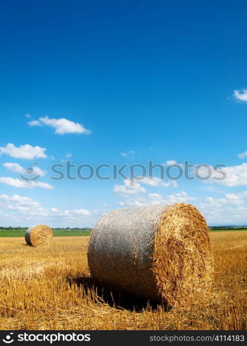 Countryside landscape with bales of hay