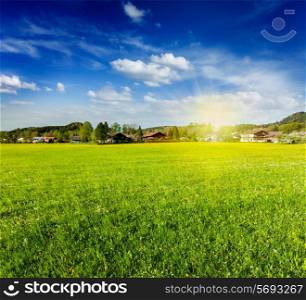Countryside meadow field with sun and blue sky, Germany