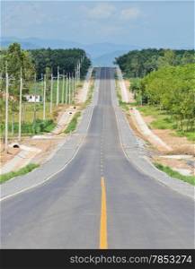 Countryside road with agriculture plantation
