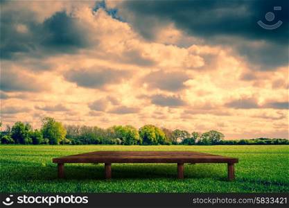 Countryside scenery with a wooden stage