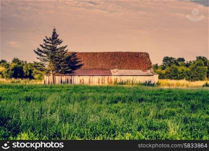 Countryside scenery with an old and weathered barn
