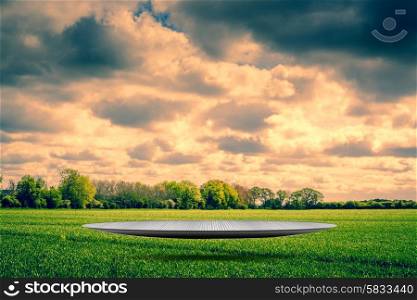 Countryside scenery with dark clouds and a futuristic stage
