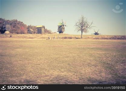 Countryside view with old windmill