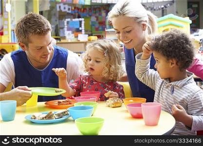 Couple and children playing with toys