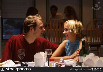 Couple at Dinner Party