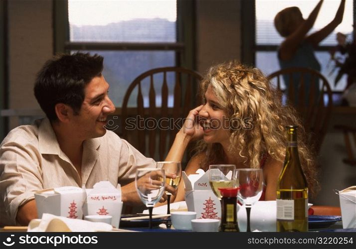 Couple at Dinner Party