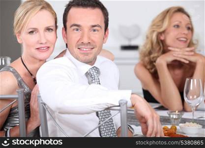 Couple at dinner party