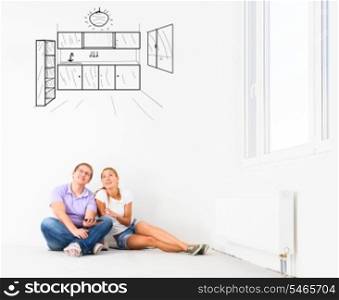 couple at their new empty apartment. new empty apartment