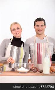 Couple baking in the kitchen