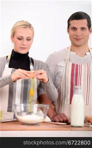 Couple baking together
