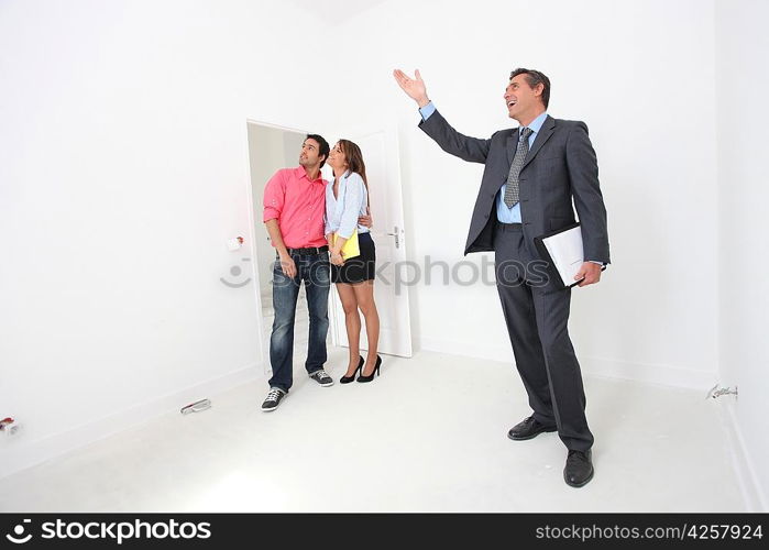 Couple being shown around property