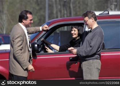 Couple Buying a Car