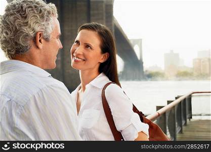 Couple by Bridge and River