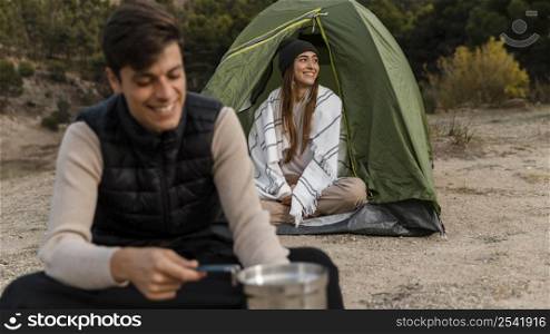 couple camping being happy outdoors