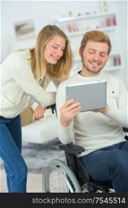 Couple can't get enough of their tablet