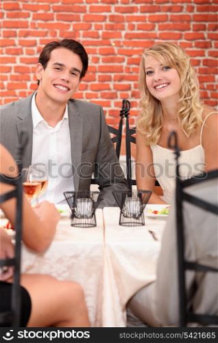 Couple celebrating anniversary in restaurant