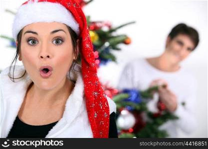 couple celebrating Christmas at home