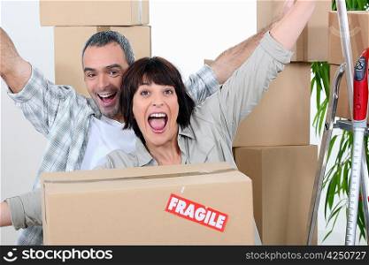 Couple celebrating moving in
