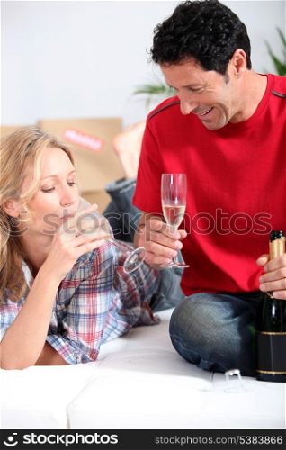 Couple celebrating new home