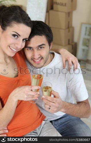 couple celebrating their new apartment