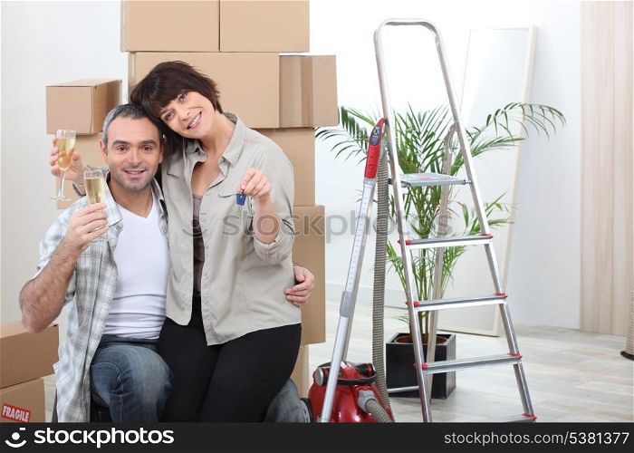 couple celebrating their new apartment