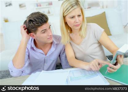 Couple checking their financial situation