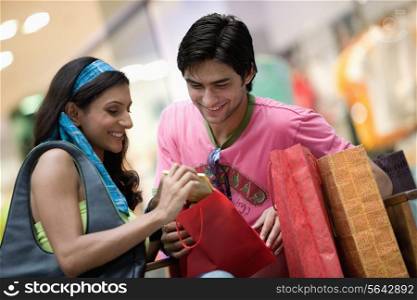 Couple checking their purchase