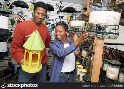 Couple Choosing a Birdhouse