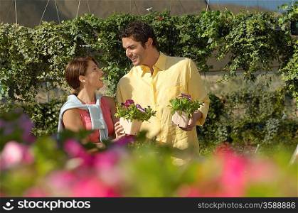 Couple Choosing Plants at a Nursery