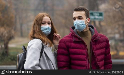 couple city wearing medical masks 2