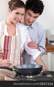 Couple cooking in their kitchen