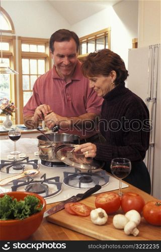 Couple Cooking in their Kitchen