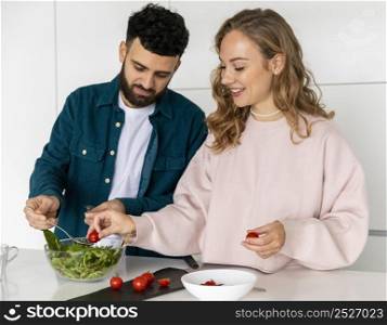 couple cooking together home