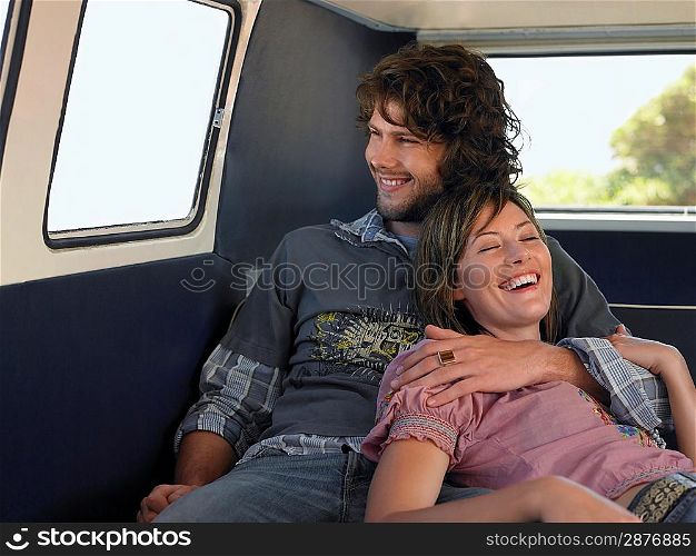 Couple Cuddling in Van