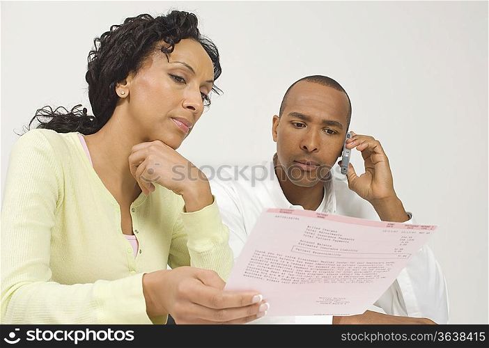 Couple Dealing with a Bill