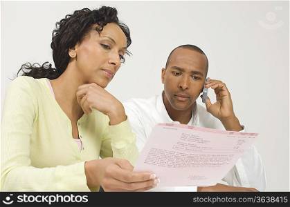Couple Dealing with a Bill