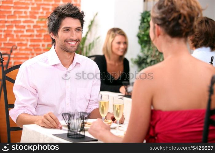 Couple dining in restaurant