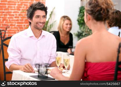 Couple dining in restaurant