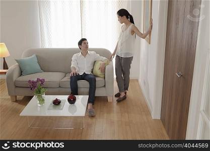 Couple discussing in living room