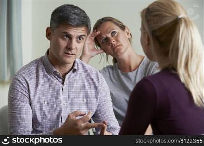 Couple Discussing Problems With Relationship Counsellor
