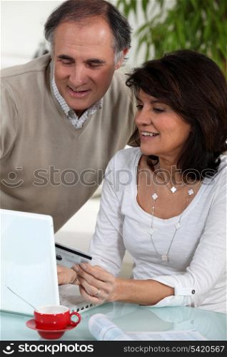 Couple doing some on-line shopping