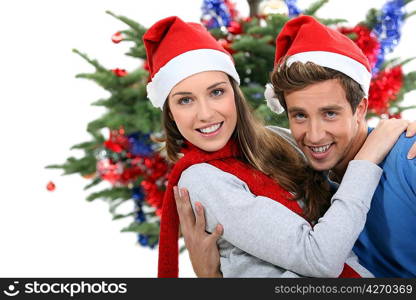 Couple dressed in festive hats