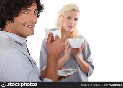 Couple drinking a hot drink