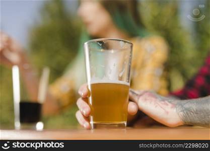 couple drinking craft beer outdoors